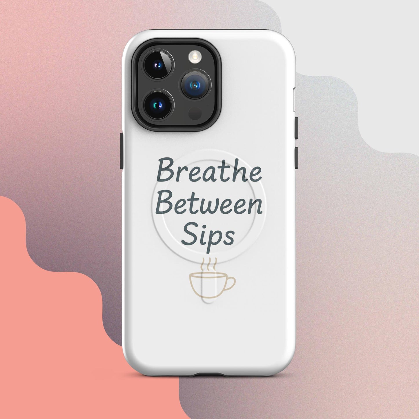 White MagSafe iPhone case with the phrase “Breathe Between Sips” and a minimal coffee cup illustration.
