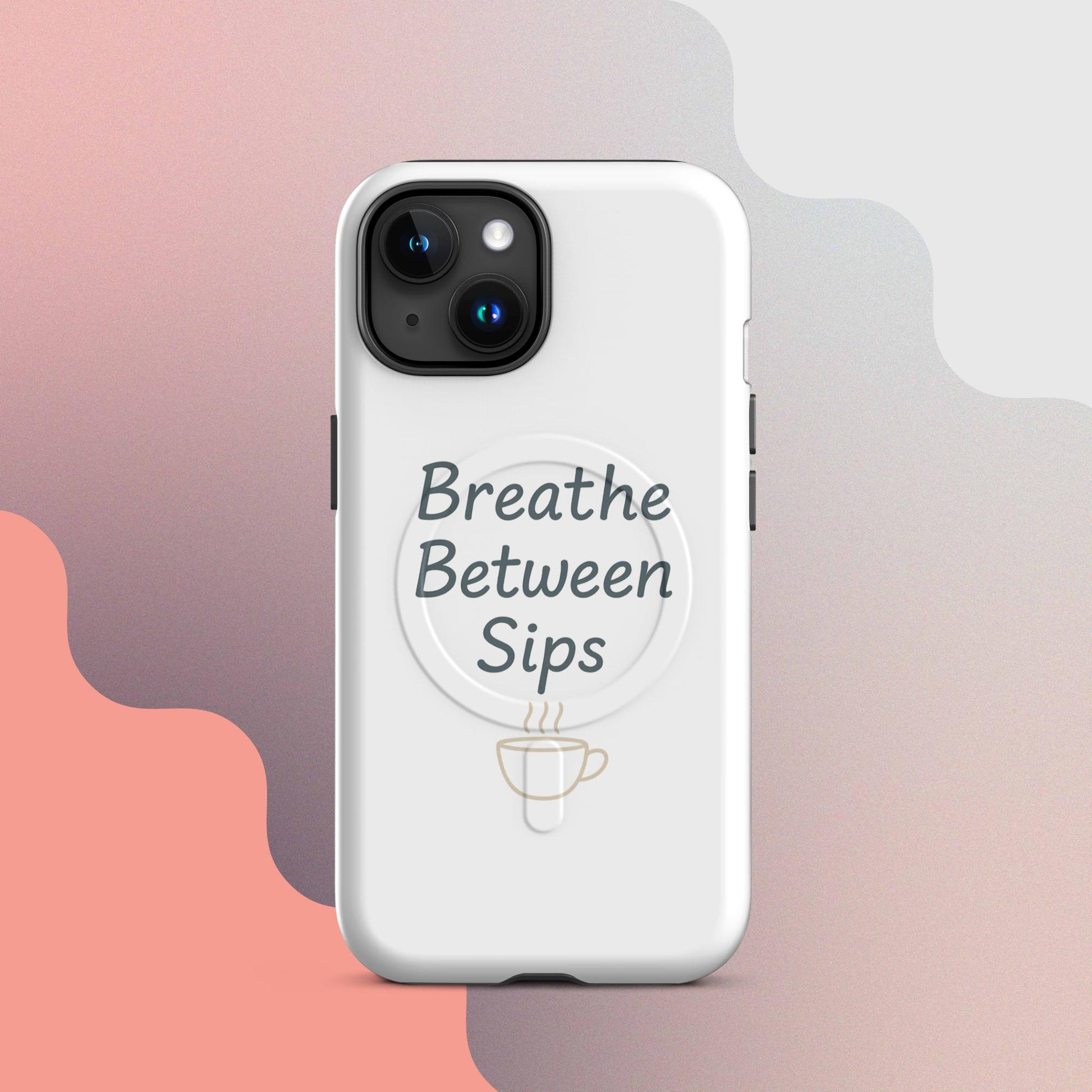 White MagSafe iPhone case with the phrase “Breathe Between Sips” and a minimal coffee cup illustration.
