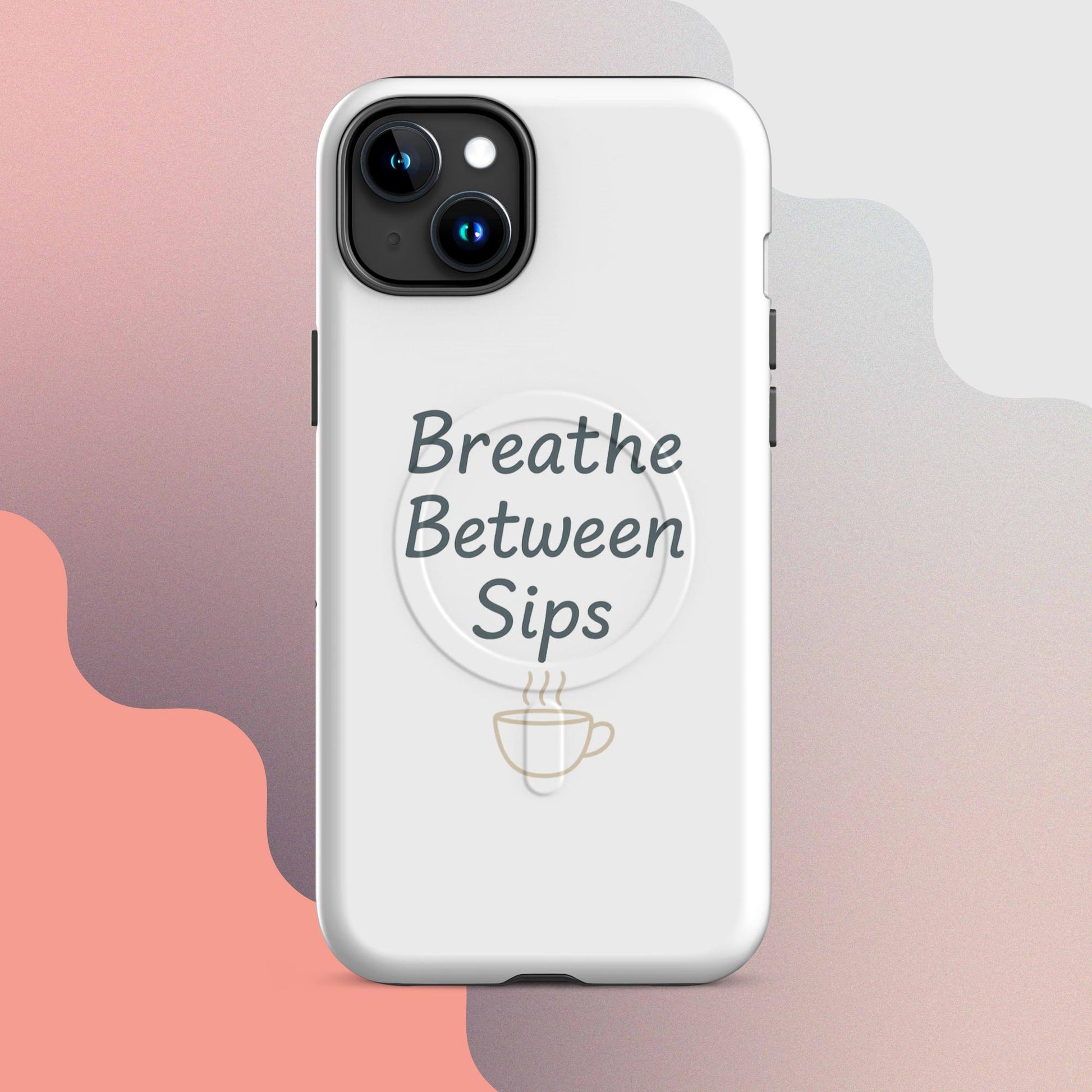 White MagSafe iPhone case with the phrase “Breathe Between Sips” and a minimal coffee cup illustration.
