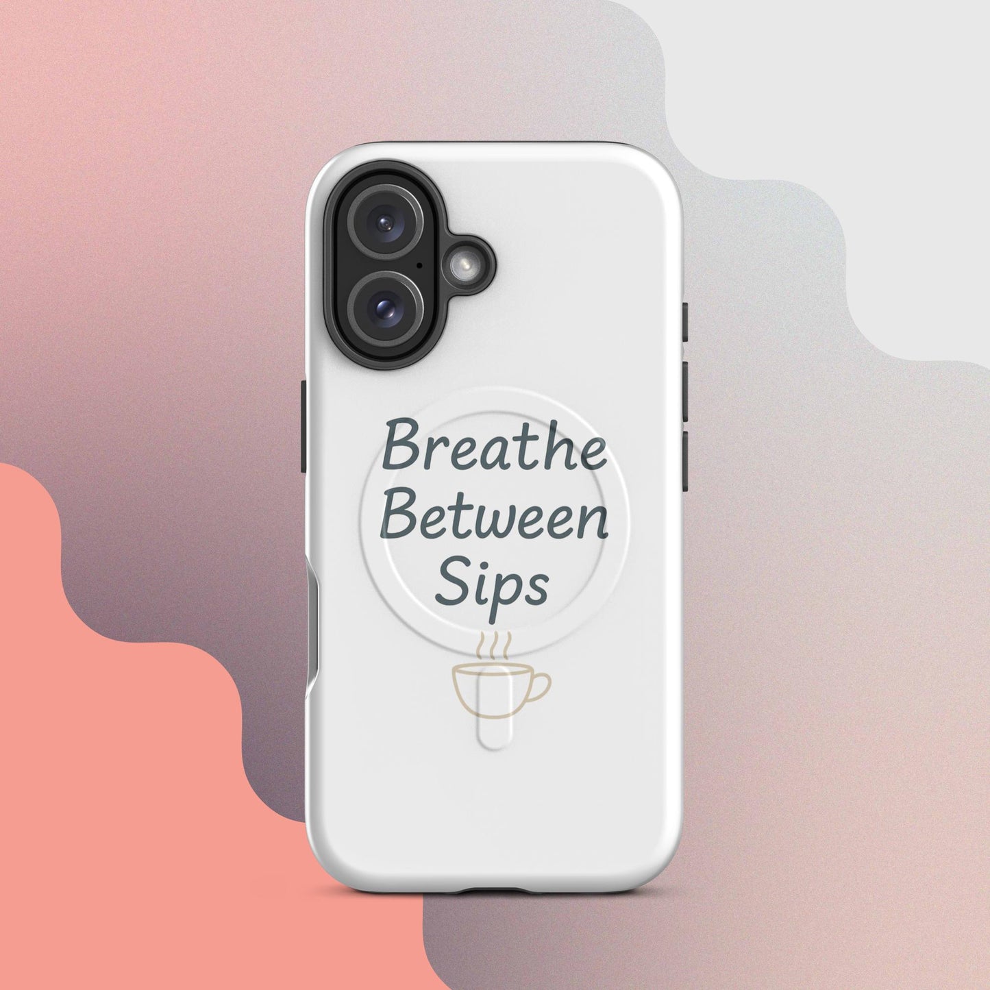 White MagSafe iPhone case with the phrase “Breathe Between Sips” and a minimal coffee cup illustration.
